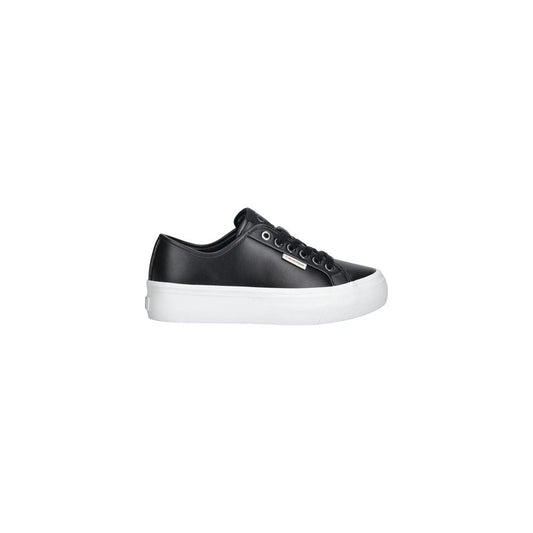 Sneakers by Calvin Klein Jeans for women in leather & rubber black features a chic design, perfectly showcasing the chic low-top style of this Women's Low Top Leather & Rubber Sneakers.