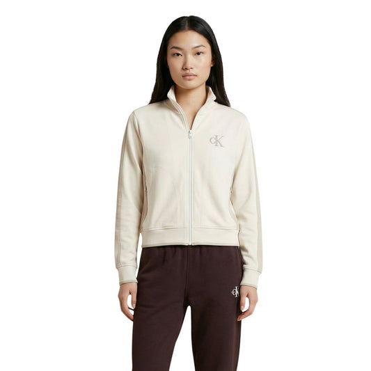 Activewear Sweatshirt by Calvin Klein Jeans for women in stretch polyester cotton beige & signature showcases a athletic silhouette with sleeves, a athletic high-collar neckline, and high-performance breathable-design for a athletic aesthetic.