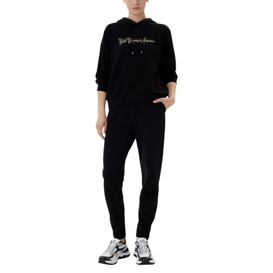 This Hooded Track Jacket by EA7 Emporio Armani for women in stretch cotton & modal black presents a contemporary silhouette, showcasing with and a contemporary hooded neckline.