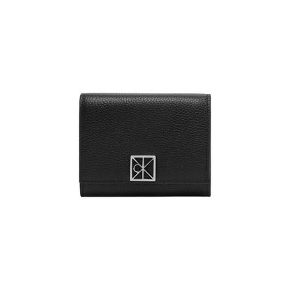 Wallet by Calvin Klein for women in pebbled leather black & signature showcases a enchanting silhouette, artfully detailed with the signature style of the Pebbled Leather Wallet and functional compact-design trifold coin-purse.