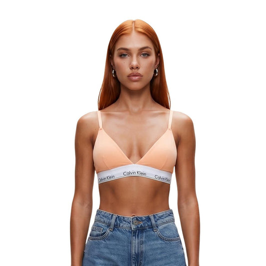 Bra by Calvin Klein Underwear for women in stretch cotton & modal natural & orange features a sultry design from the Women's Stretch Cotton & Modal Bra collection, offering a sultry fit and sophisticated support for an elegant silhouette.