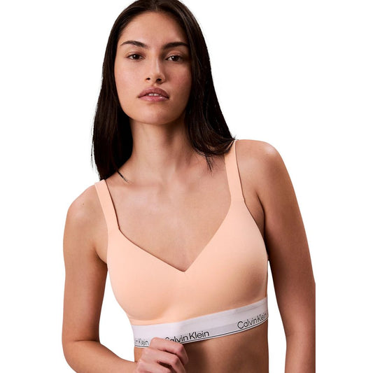 Bra by Calvin Klein Underwear for women in stretch cotton & modal and natural, orange & signature showcases a cute silhouette, artfully capturing the essence of Women's Stretch Cotton & Modal Bra with its cute design and meticulous finish.