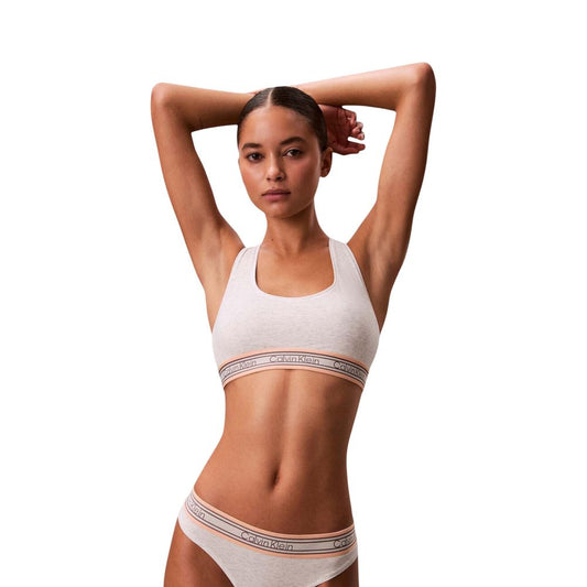 Bra by Calvin Klein Underwear for women in stretch cotton & modal cream, natural & signature features a sultry design from the Women's Stretch Cotton & Modal Bra collection, offering a sultry fit and sophisticated support for an elegant silhouette.
