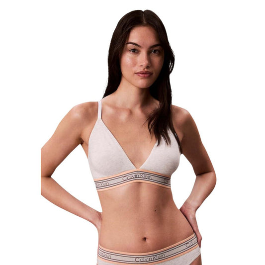Bra by Calvin Klein Underwear for women in stretch cotton & modal and cream & natural showcases a cute silhouette, artfully capturing the essence of Women's Stretch Cotton & Modal Bra with its cute design and meticulous finish.