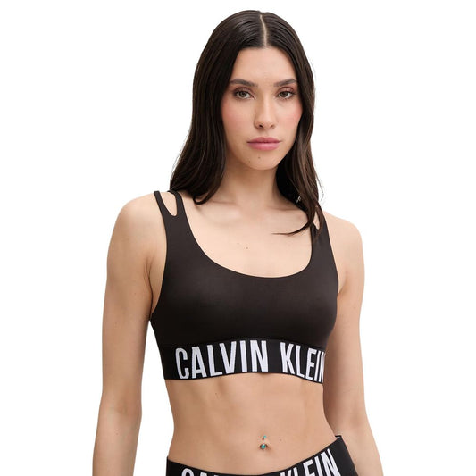 Bra by Calvin Klein Underwear for women in stretch polyester black & natural features a sultry design from the Women's Stretch Polyester Bra collection, offering a sultry fit and sophisticated support for an elegant silhouette.
