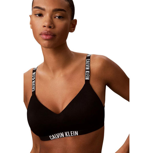 Bra by Calvin Klein Underwear for women in polyester black & natural features a sultry design from the Women's Polyester Bra collection, offering a sultry fit and sophisticated support for an elegant silhouette.