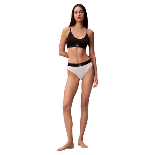 Thongs by Calvin Klein Underwear for women in stretch polyester white features a on trend silhouette, showcasing the signature style of the Women's Stretch Polyester Thongs with a on trend finish.