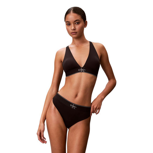 Thongs by Calvin Klein Underwear for women in stretch polyester black features a contemporary silhouette, showcasing the distinct Women's Stretch Polyester Thongs design with a contemporary cut.