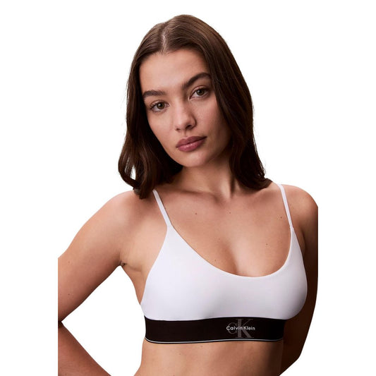 Bra by Calvin Klein Underwear for women in stretch polyester and animal, natural, white & print showcases a cute silhouette, artfully capturing the essence of Women's Stretch Polyester Bra with its cute design and meticulous finish.