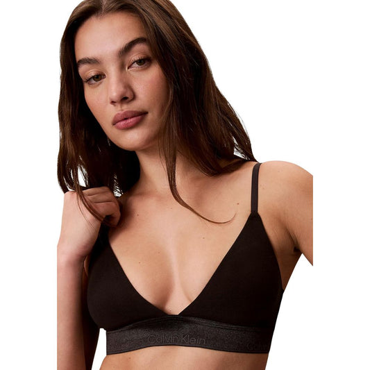 Bra by Calvin Klein Underwear for women in stretch cotton & modal black & natural features a sultry design from the Women's Stretch Cotton & Modal Bra collection, offering a sultry fit and sophisticated support for an elegant silhouette.