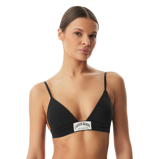Bra by Calvin Klein Underwear for women in stretch cotton black & natural features a discreet silhouette, showcasing the discreet design and fit of this City Women's Stretch Cotton Bra.
