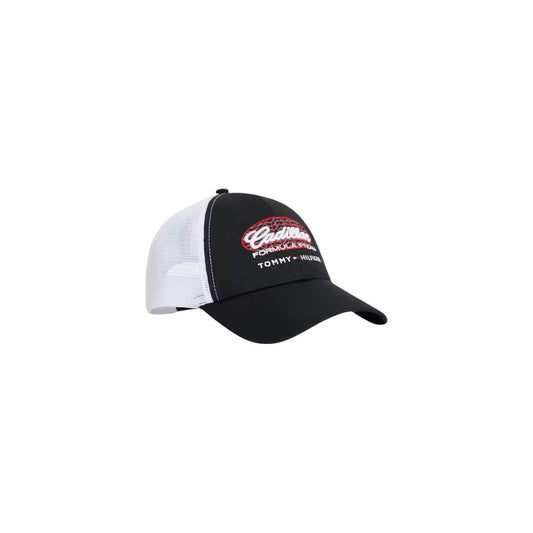 This Trucker Cap by Tommy Hilfiger for men in organic cotton black & white presents a distinguished silhouette, meticulously showcasing the signature aesthetic and high-end profile of the Organic Cotton Trucker Cap.