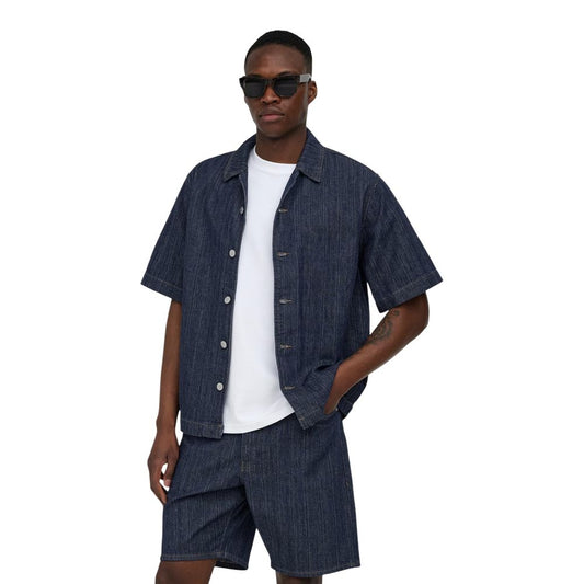 T-Shirt by Only & Sons for men in denim cotton blue features a plush silhouette, showcasing a sophisticated and short-sleeve for a truly plush finish.