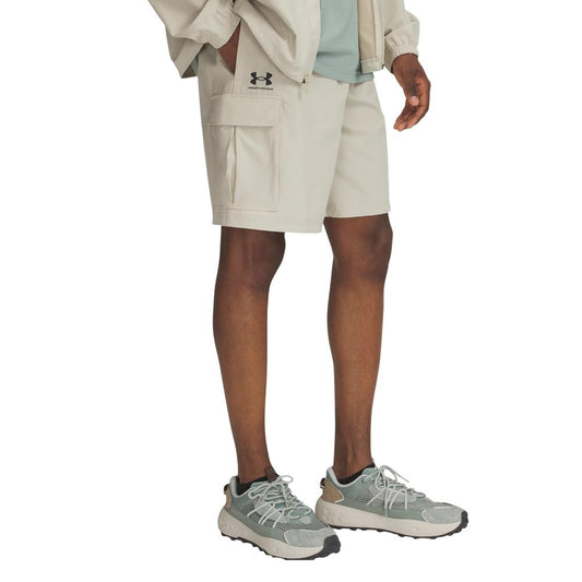 Bermuda Shorts by Under Armour for men in stretch polyester beige features an tailored silhouette, showcasing a tailored athletic & regular-fit with a short and for a sophisticated look.