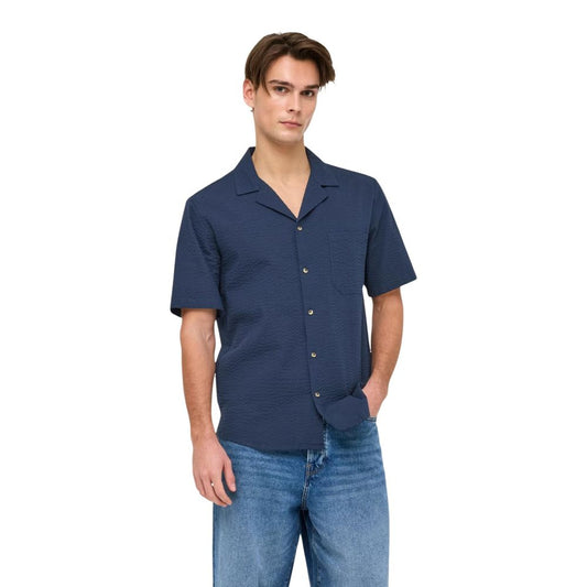 Shirt by Only & Sons for men in cotton blue presents a discerning silhouette, showcasing a sophisticated and short-sleeve for a truly discerning finish.