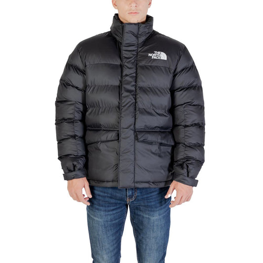 Puffer Jacket by The North Face for men in polyester black features a dramatic silhouette, showcasing a sophisticated high-collar neckline and distinctive insulated & pockets for a dramatic aesthetic.