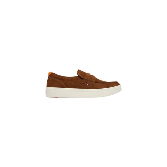 This Loafer Slip-On Strap Shoes by Tommy Hilfiger for men in suede leather & rubber brown & signature features an exquisite silhouette from the Men's Suede Leather & Rubber Loafer Slip-On Strap Shoes collection, defined by a sophisticated and elegant .