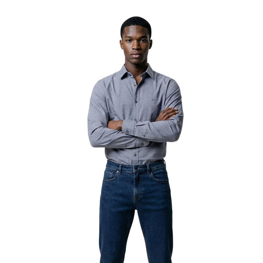 Dress Shirt by Armani Exchange for men in cotton polyester blue presents a discerning silhouette, showcasing a sophisticated and for a truly discerning finish.