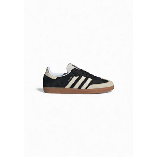 Sneakers by Adidas Originals for women in leather & rubber black, signature & striped presents a on trend silhouette from the Icon Women's Low Top Leather & Rubber Sneakers collection, showcasing a on trend low-top style for an elevated aesthetic.