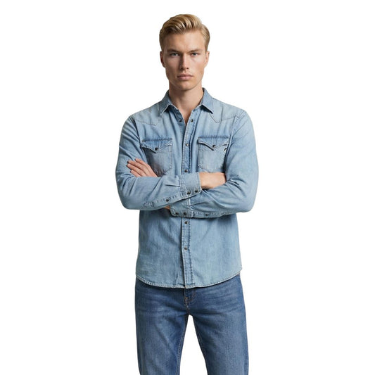 Shirt by Replay for men in denim cotton light-blue presents a discerning silhouette, showcasing a sophisticated and for a truly discerning finish.