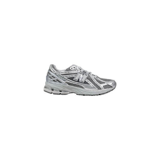 Athletic Sneakers by New Balance for men in synthetic silver features an exquisite silhouette, showcasing the premium athletic style of the City Icon Men's Athletic Synthetic Sneakers with an exquisite finish.