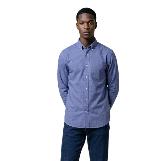 Dress Shirt by Gant for men in cotton blue & signature features an architectural silhouette with a refined long-sleeve and elegant round button-down-collar neckline for a architectural look.