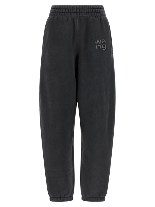 Joggers by T BY ALEXANDER WANG for women in polyester cotton black presents a refined pantology silhouette, artfully defined by a refined pantology , long, and a sophisticated .