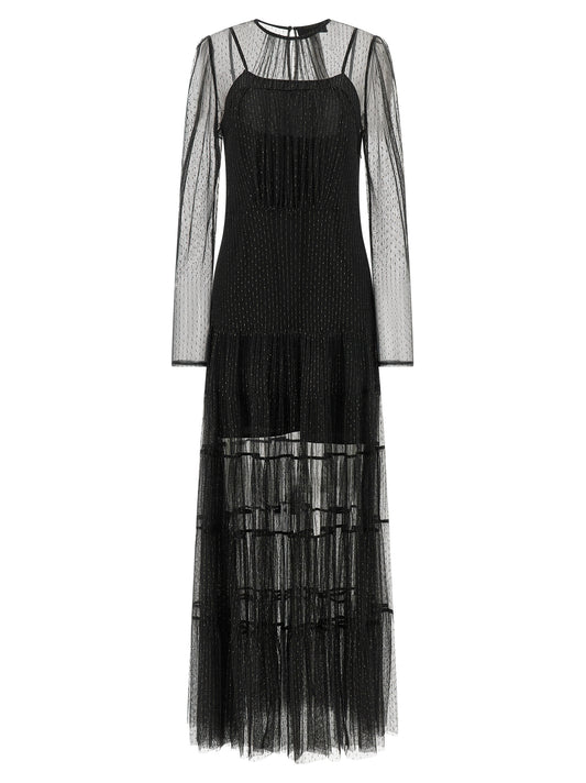 Dress by Twinset for women in polyamide polyurethane & tulle black, patterned & pinstripe features an eye catching silhouette with a sophisticated , elegant long-sleeve, and a refined long for a eye catching aesthetic.