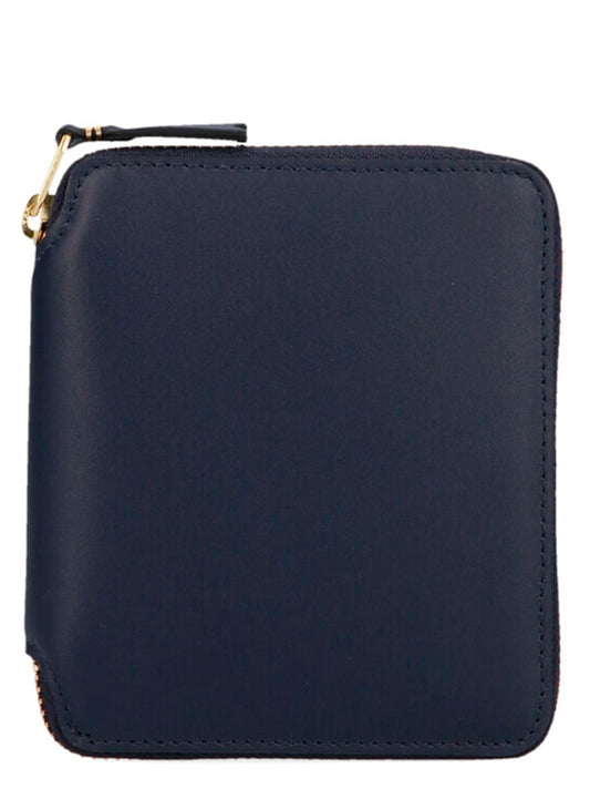 Wallet by Comme Des Garçons for men in calfskin leather blue showcases a distinguished silhouette, artfully capturing the essence of the distinguished Arecalf Calfskin Leather Wallet design with functional zip-around.