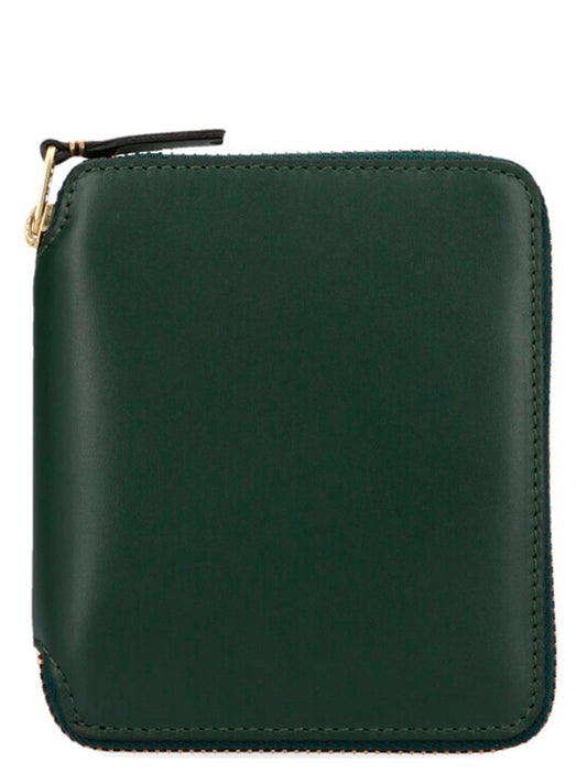 Wallet by Comme Des Garçons for men in calfskin leather bicolour & green presents a refined silhouette, artfully capturing the essence of the Arecalf Calfskin Leather Wallet design with sophisticated zip-around for a refined look.