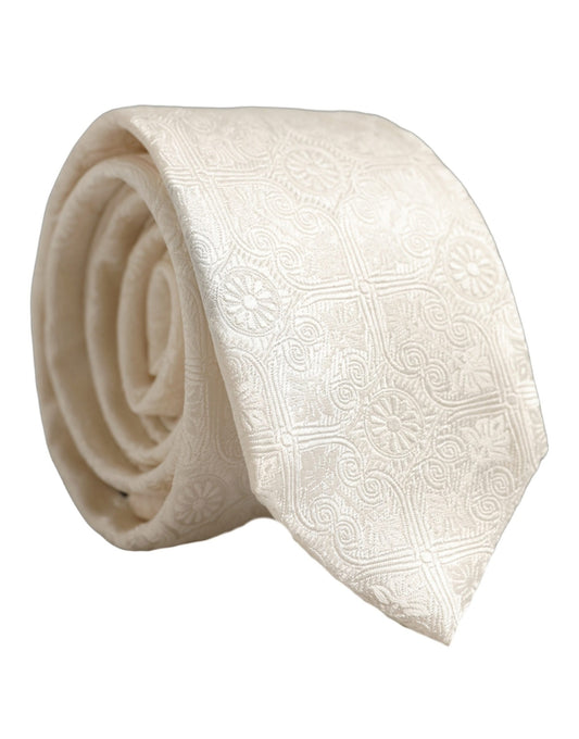 Necktie by Dolce & Gabbana for men in silk white, patterned, damask, floral & jacquard features a sun-drenched silhouette, showcasing the sun-drenched design of this Silk Necktie with a sun-drenched finish.
