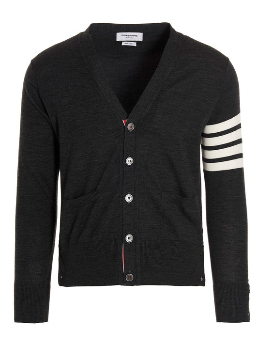 Cardigan by Thom Browne for men in merino wool gray & signature features a dramatic silhouette, showcasing a sophisticated v-neck neckline and dramatic long-sleeve detail for a timeless, premium look.