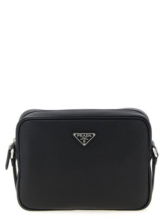 Crossbody Messenger Bag by Prada for men in calfskin leather black features a distinguished Calfskin Leather Crossbody Messenger Bag design with a secure zipper, ample , and versatile crossbody-strap, shoulder-strap & adjustable-strap for a distinguished look.