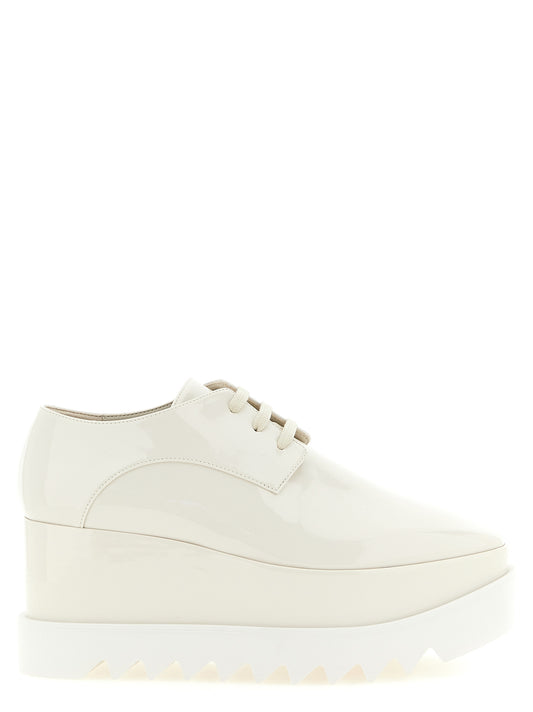 Wedge Sandals by Stella McCartney for women in polyethylene & polyurethane cream & white features an effortlessly chic silhouette from the Women's Polyethylene & Polyurethane Wedge Sandals collection, showcasing a effortlessly chic wedge and elegant square toe style.