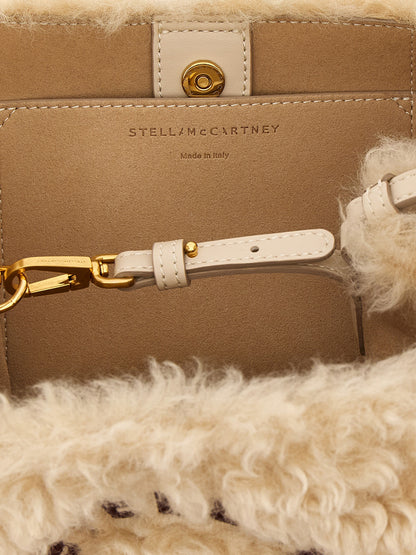 Shoulder Bag by Stella McCartney for women in polyester suede leather beige & gold features a enviable silhouette, showcasing a secure , ample , and enviable shoulder-strap, handle & adjustable-strap for a enviable finish.