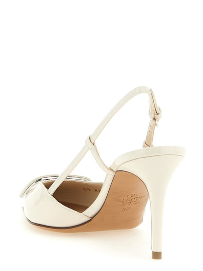 High-Heel Stiletto Slingback Pumps Heels by Valentino Garavani for women in calfskin leather white & signature features an captivating silhouette, showcasing the elegant V Logo Women's Calfskin Leather High-Heel Stiletto Slingback Pumps Heels design with a stiletto high-heel and a sophisticated pointed toe style.