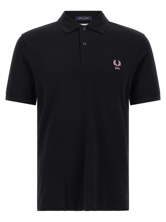 Polo Shirt by Comme Des Garçons for men in cotton black, multicolor, pink, patterned & striped presents a sleek silhouette, featuring a refined and for a sleek finish.