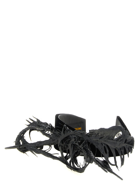 Headband by Comme Des Garçons for women in buffalo leather black features a ornamental silhouette, artfully capturing the essence of the ornamental Rayon Headband design for a sophisticated look.