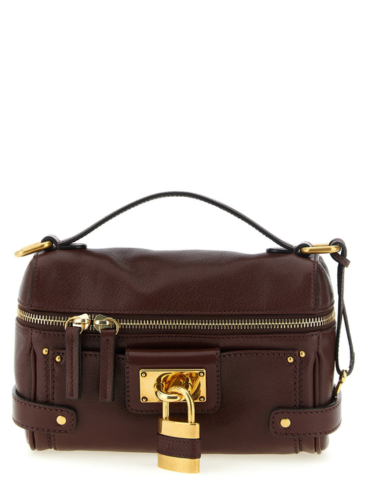 Shoulder Travel Bag by Chloé for women in buffalo leather brown & gold features an effortlessly chic silhouette with a secure zipper, ample , and versatile shoulder-strap, handle, adjustable-strap & detachable-strap for effortlessly chic everyday luxury.
