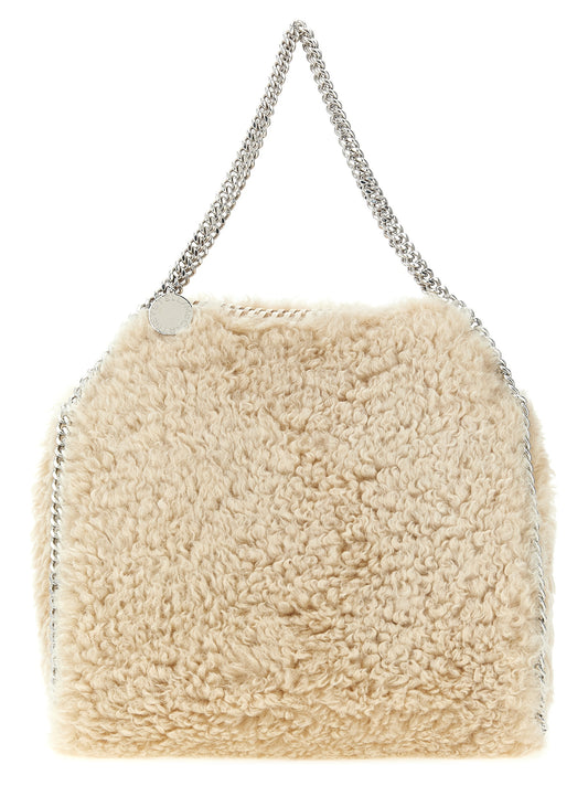 Medium Shoulder Bag by Stella McCartney for women in polyester beige & signature features a distinguished silhouette, showcasing a secure zipper & magnetic and distinguished with versatile shoulder-strap & handle for a distinguished finish.