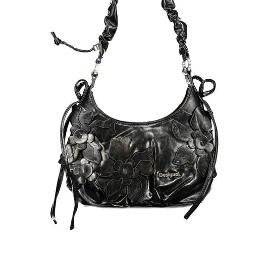 Handbag by Desigual for women in polyurethane black presents a ornamental silhouette, showcasing a secure zipper, ample cardholder, and versatile adjustable-strap & handle for a ornamental finish.