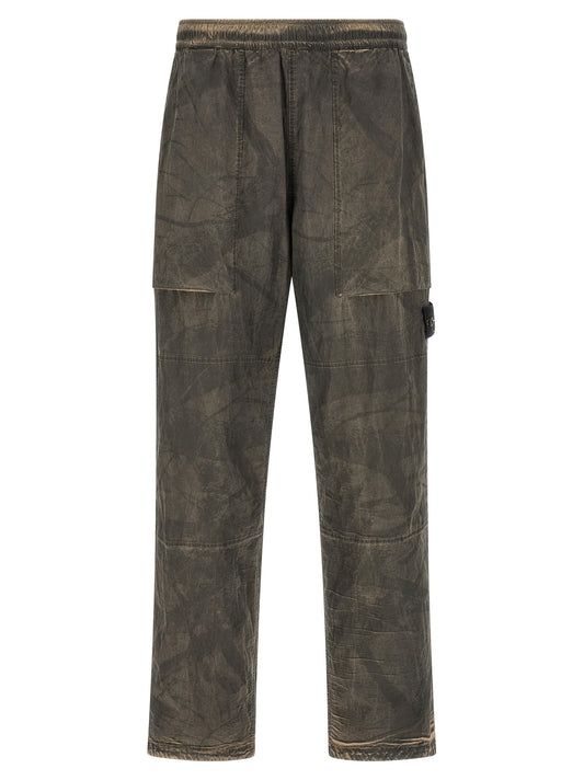 Trousers by Stone Island for men in polyamide gray features a artisanal silhouette, showcasing a sophisticated relaxed-fit with a long and for a artisanal finish.