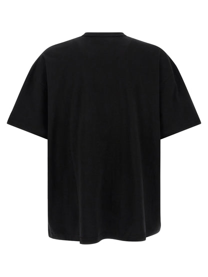 T-Shirt by Comme Des Garçons for men in cotton black & print showcases a unassuming silhouette, artfully detailed with a refined and unassuming for a sophisticated, contemporary look.