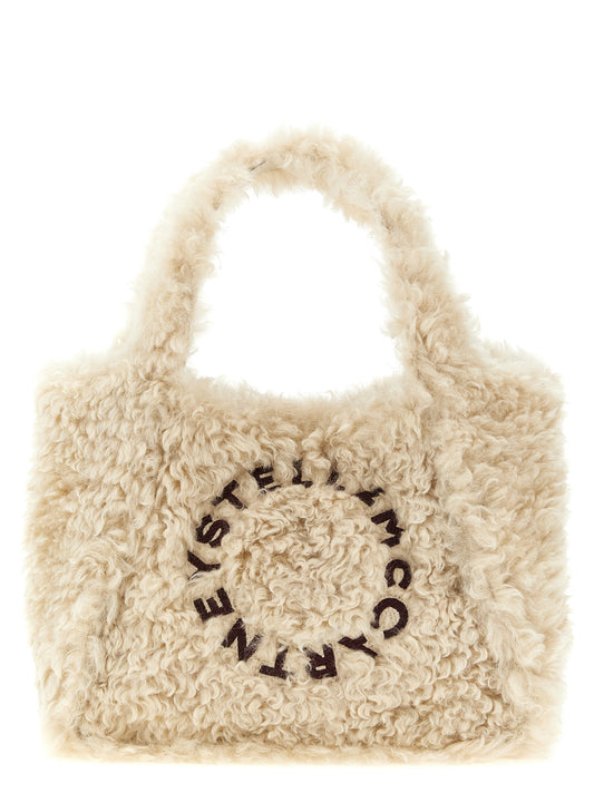 Tote Clutch Bag by Stella McCartney for women in polyester suede leather beige & signature features an metropolitan chic Polyester Suede Leather Tote Clutch Bag design with a secure magnetic, metropolitan chic , and versatile adjustable-strap & handle for a metropolitan chic look.