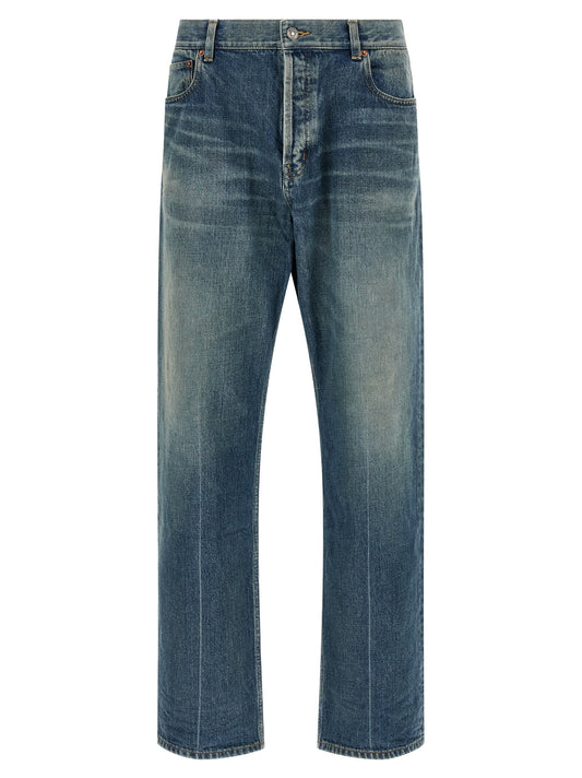 Jeans by Saint Laurent for men in cotton denim blue features a refined silhouette with a refined tapered-leg & relaxed-fit, defined by a and a refined long for a refined finish.