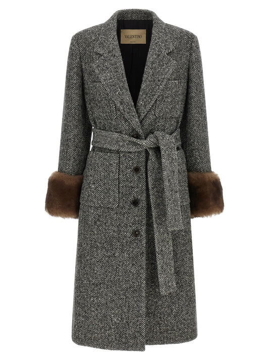 Overcoat by Valentino Garavani for women in polyamide & virgin wool bicolour, black, white, patterned & chevron presents a luxurious silhouette, showcasing a luxurious and sophisticated pockets for a premium, luxurious look.