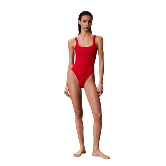 One-Piece Swimsuit by Calvin Klein Jeans for women in polyamide polyester & lycra red features an jaw dropping silhouette, showcasing the jaw dropping Women's Polyamide Polyester & Lycra One-Piece Swimsuit design with a sophisticated cut for a jaw dropping finish.