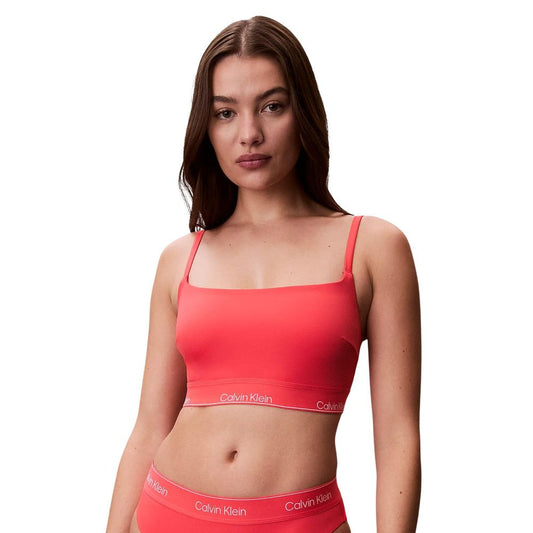 Bikini by Calvin Klein Jeans for women in stretch polyester orange & patterned presents a sun-drenched silhouette, showcasing the sun-drenched Women's Stretch Polyester Bikini design with a sun-drenched cut for a premium finish.