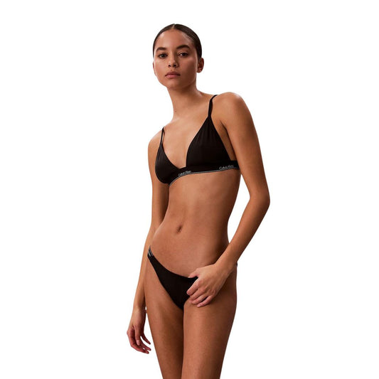 Swimwear Top by Calvin Klein Jeans for women in stretch polyester black features a refined silhouette, beautifully highlighting the premium cut and style of this Women's Stretch Polyester Swimwear Top.