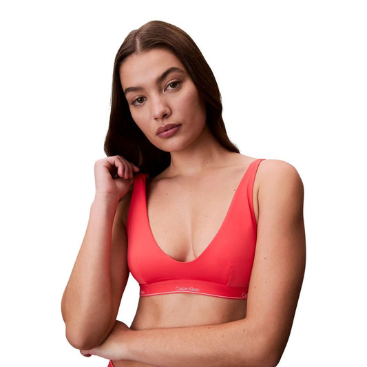 Bikini by Calvin Klein Jeans for women in stretch polyester orange features an riviera chic silhouette that beautifully encapsulates the signature aesthetic of the Women's Stretch Polyester Bikini.